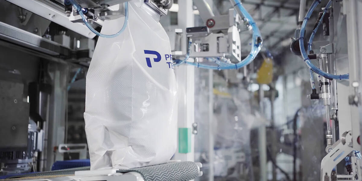 Filled bag on conveyor