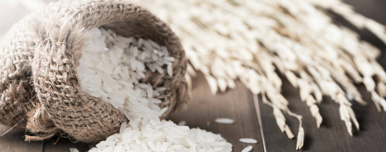 Stock image of jasmine rice in a small sack