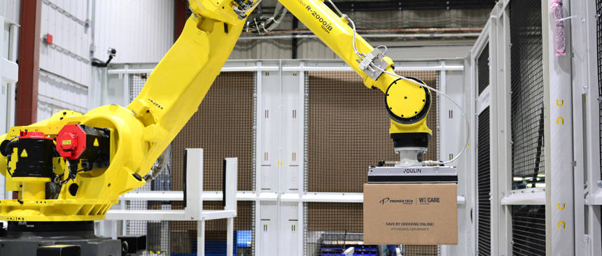 Robotic palletizer handling a box