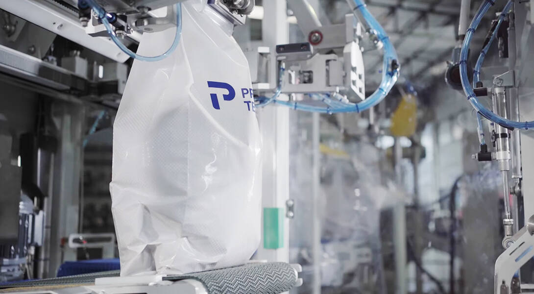 Filled bag on conveyor 