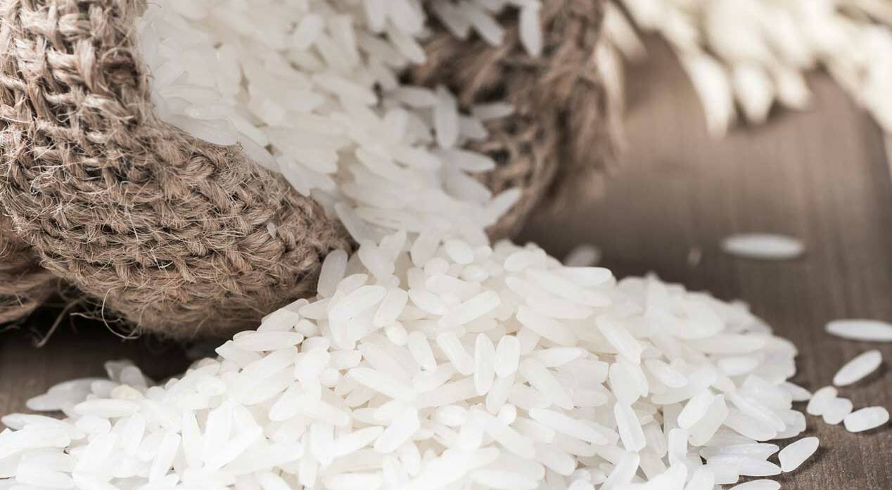 Stock image of jasmine rice in a small sack