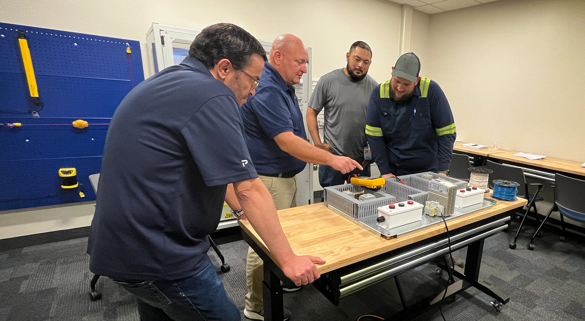 Employees being trained for Premier Tech equipment