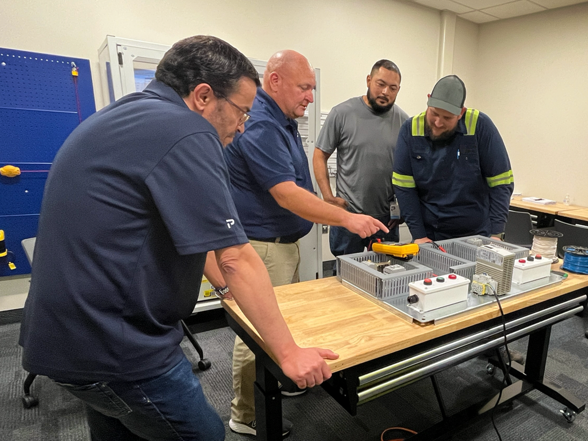 Employees being trained for Premier Tech equipment