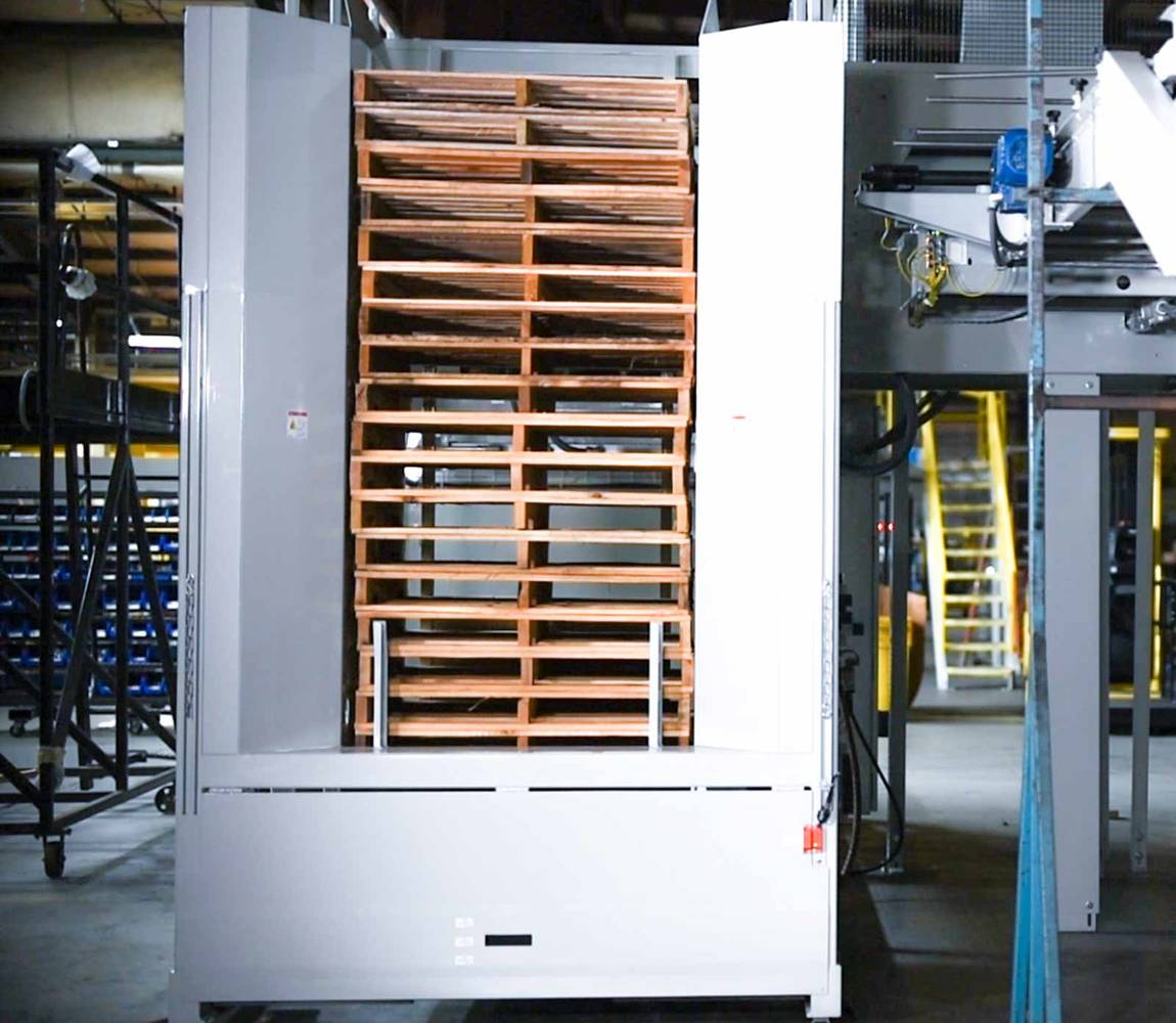 Conventional case palletizer stacked pallets