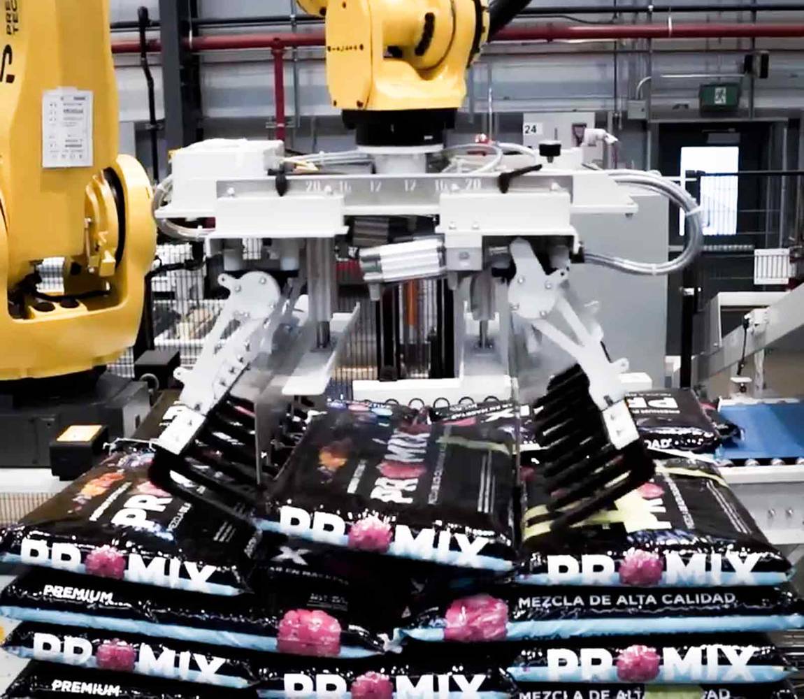 Robotic palletizing - gripper placing bag on a pallet