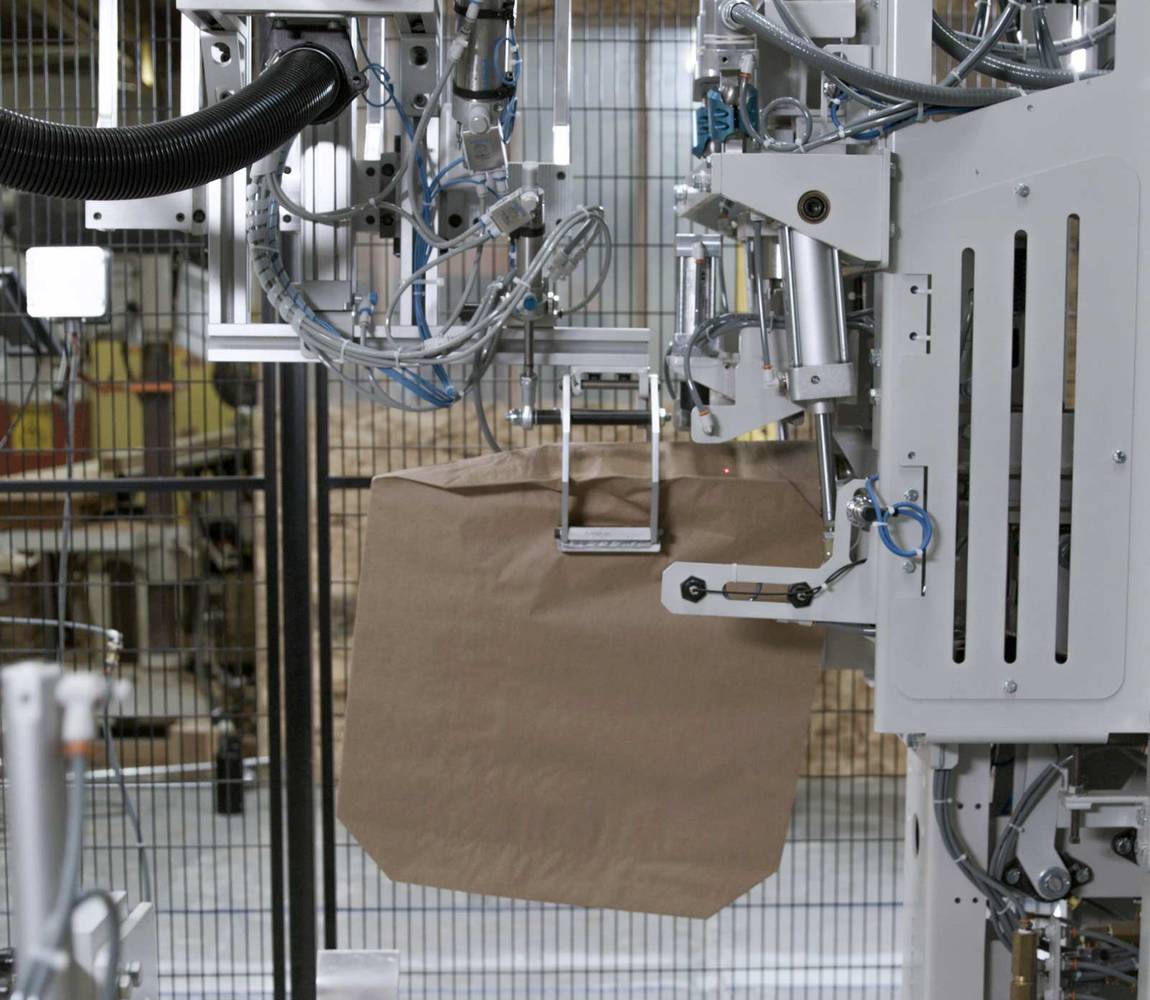 Robotic valve bag applicator - bag filling