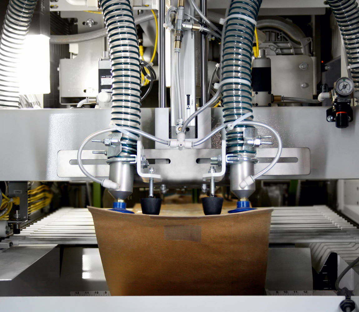 Open mouth bagger OML Series - bag handling