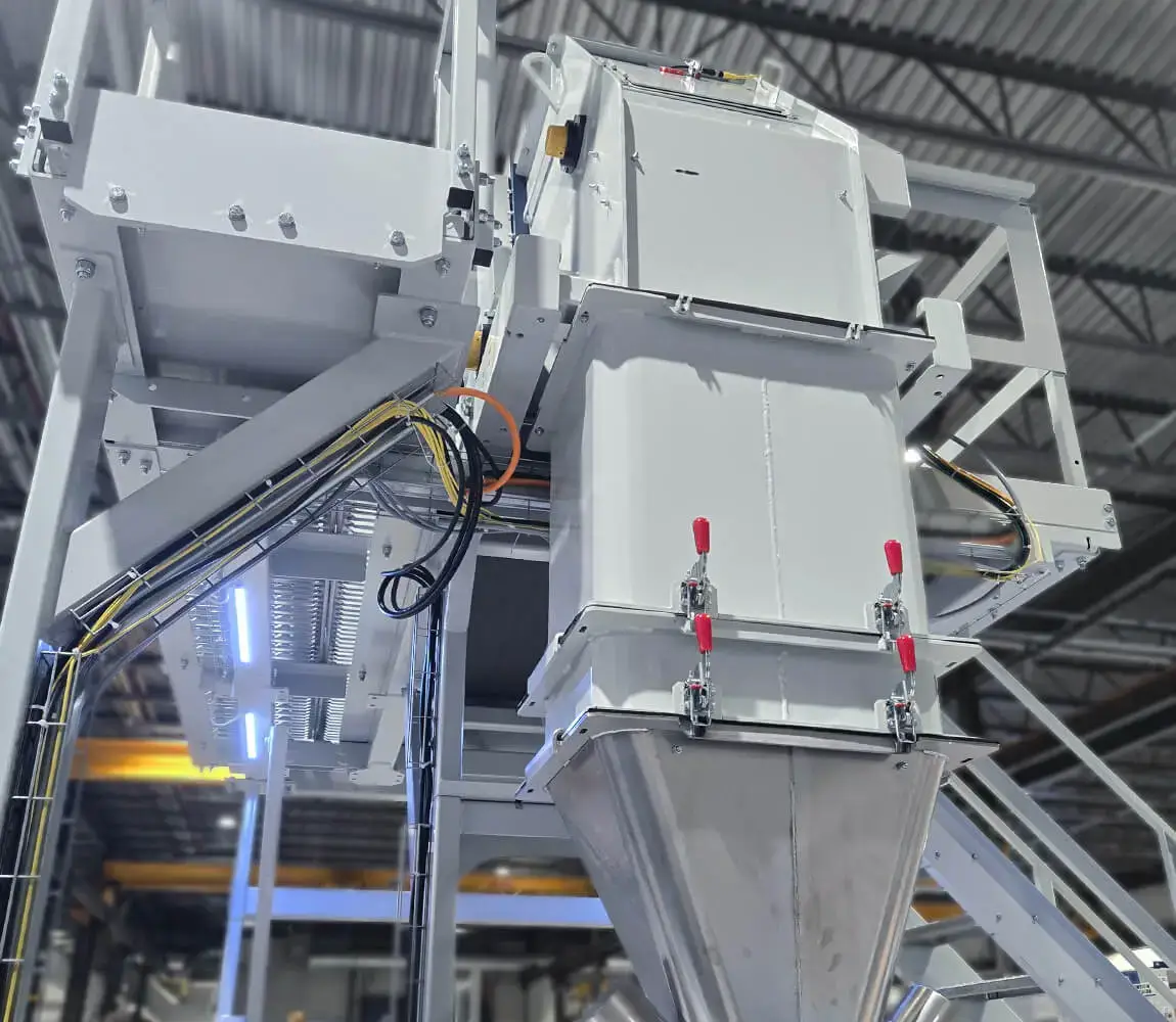 Manual bagger with volumetric feeder