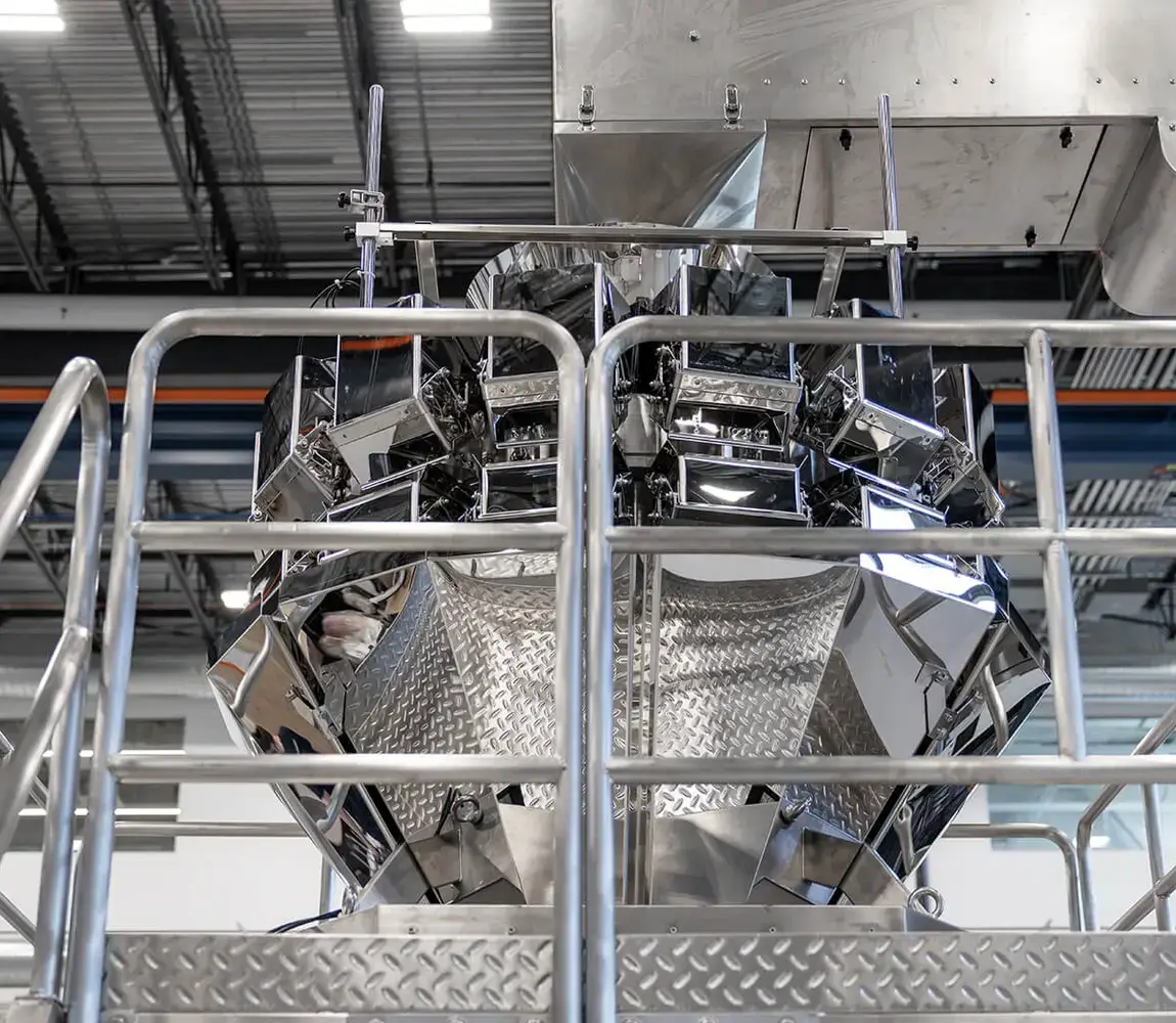 Multi-head weigher available with the Chronos OMK pouch filler