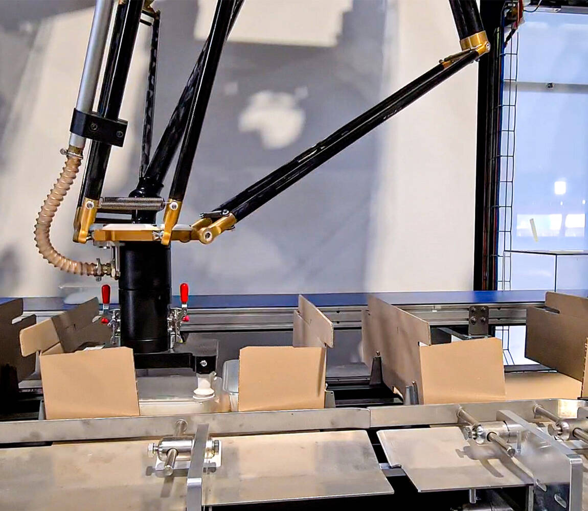 case-packing-CPW-Series-video-splash Wrap around case packer - tray packing side view