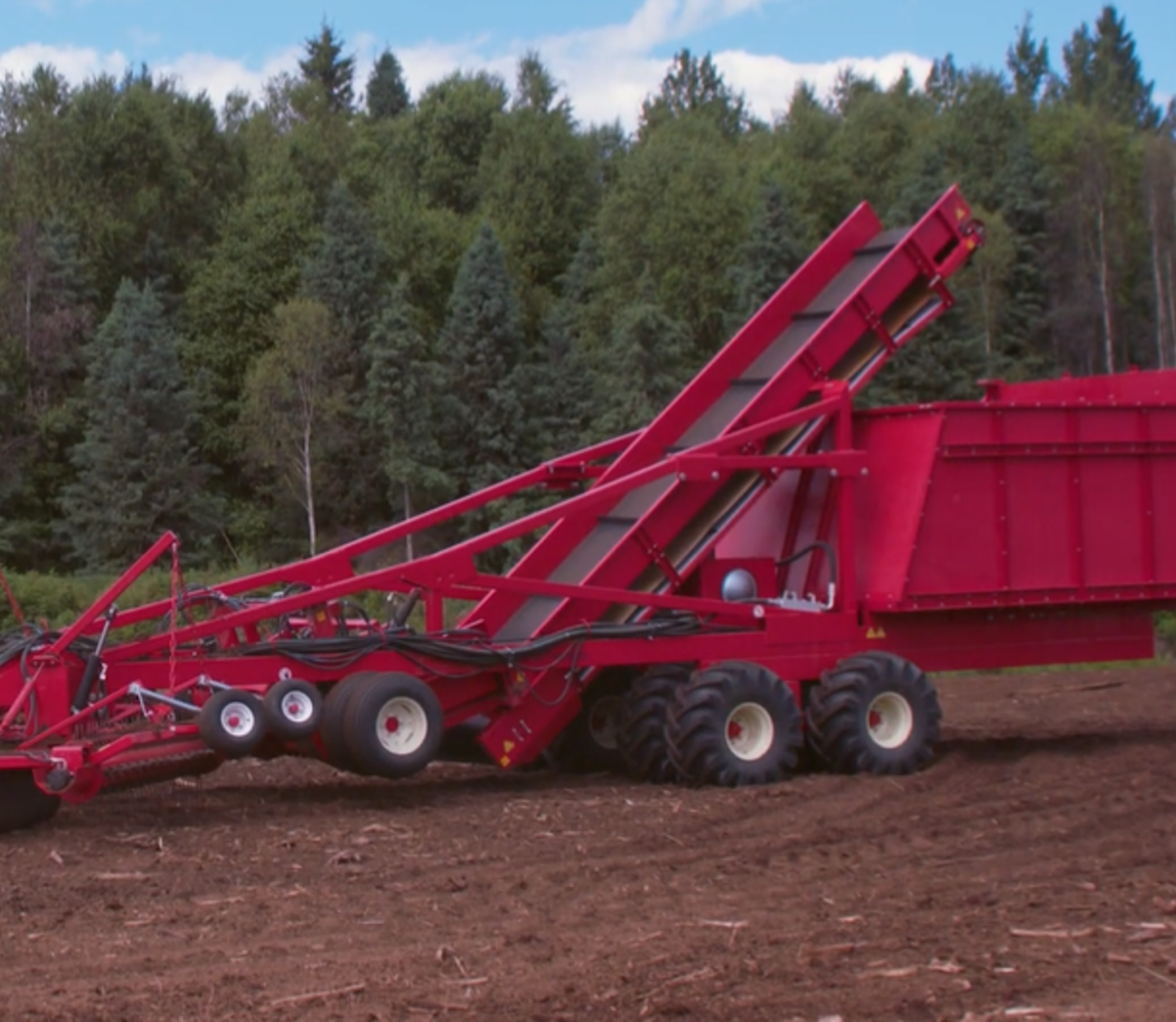 Root and stump picker in a peat moss field 