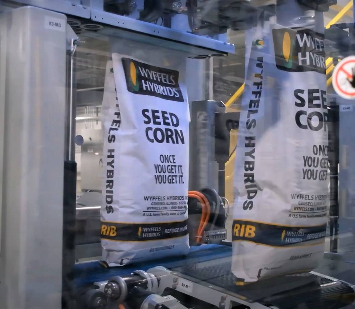 Open-mouth bagger for seed Open-mouth bagger for seed