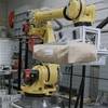 Robotic valve bag applicator - palletizer