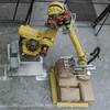 Robotic valve bag applicator - top view