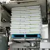 Bags pressed against the plate of a conventional palletizer