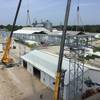 Agricultural facility construction with cranes