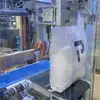 The open-mouth bagger fills a bag