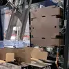 Cardboard blank in a case former