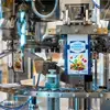CHRONOS OMK Pre-made pouch filler seals a pouch