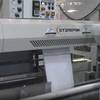 Pinch bottom bag closer in manufacturing plant