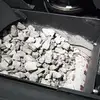 Volumetric filler for bagging machine