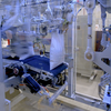 OMI Series open mouth bagger with integrated sealer