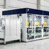 Premier Tech's Robotic Case Packer with 3 Robot Stations