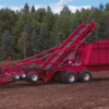 Root and stump picker thumbnail Root and stump picker in a peat moss field