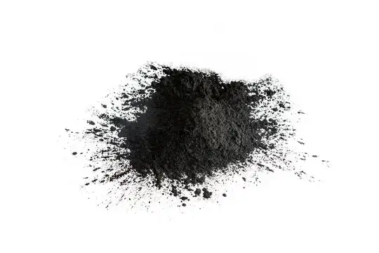 Carbon black powder on a white backdrop