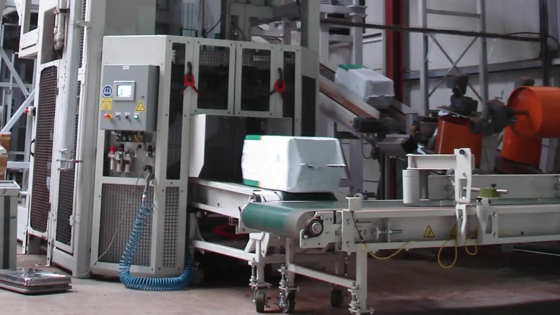 Compression bagger - bag exit
