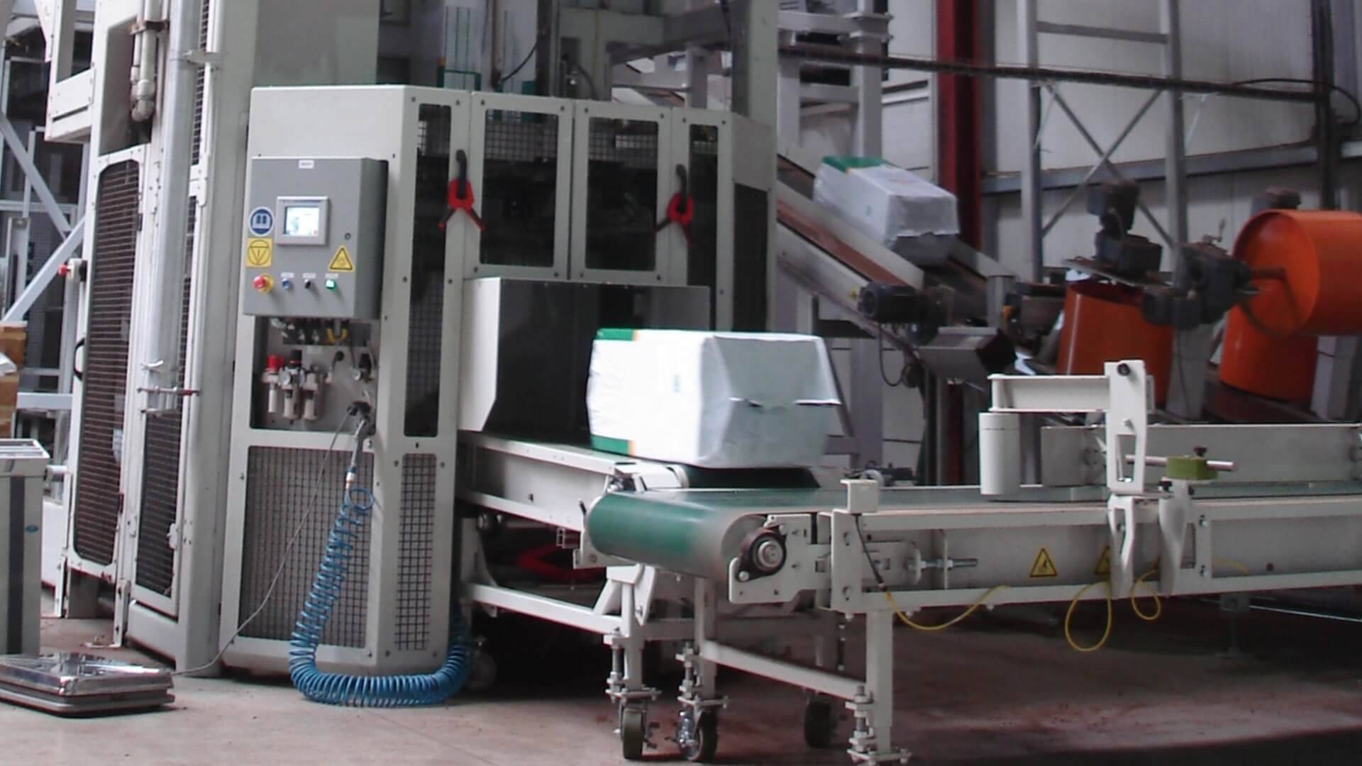 Compression bagger - bag exit