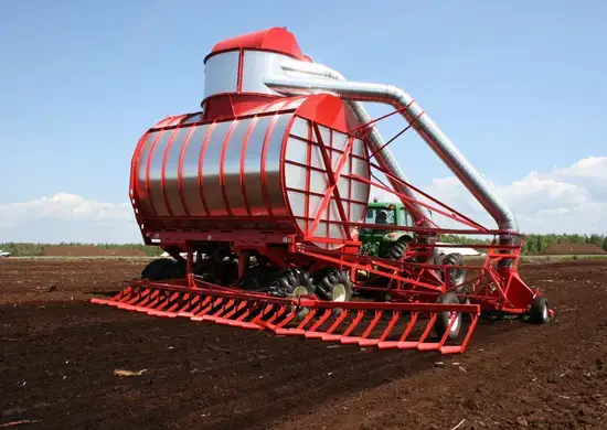 Two-head vacuum peat harvester