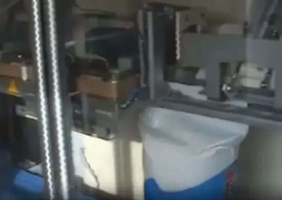 Open mouth bagger bag sealing