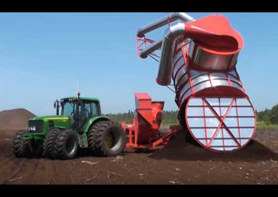 Tractor with Premier Tech peat moss field equipment