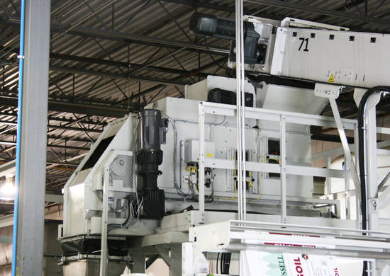 Volumetric filler for bagging machine